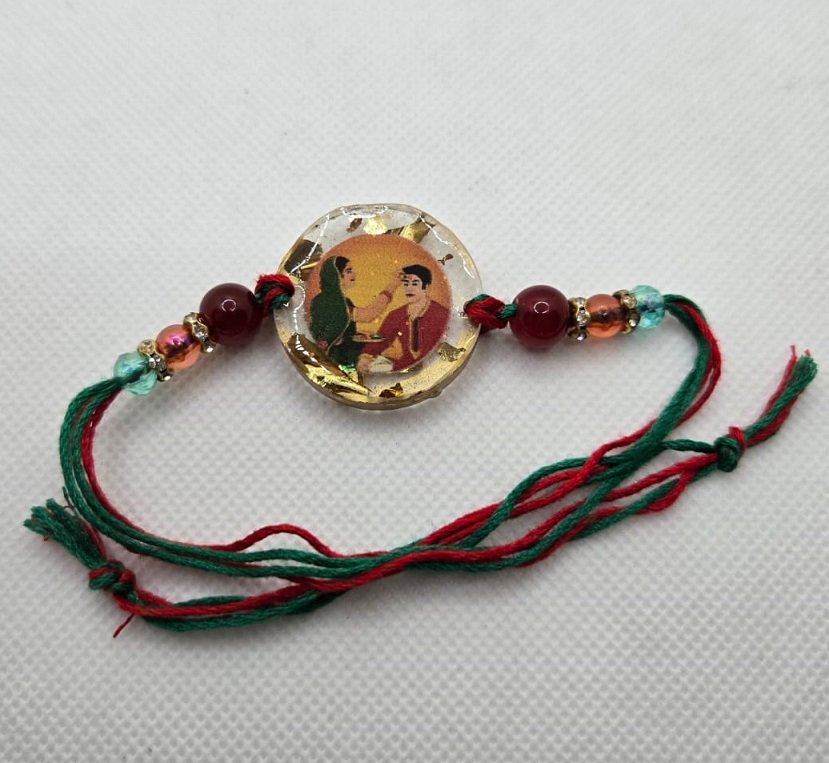 Designer Resin Brother Rakhi with Traditional Brother-Sister Artwork