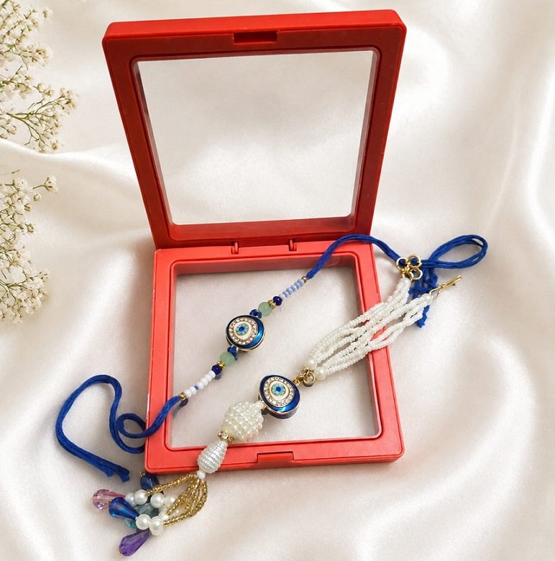 Blue Beaded Pearl Rakhi with Evil Eye Design